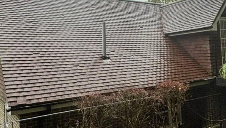 A cleaned roof with clear guttering, fascias and soffits