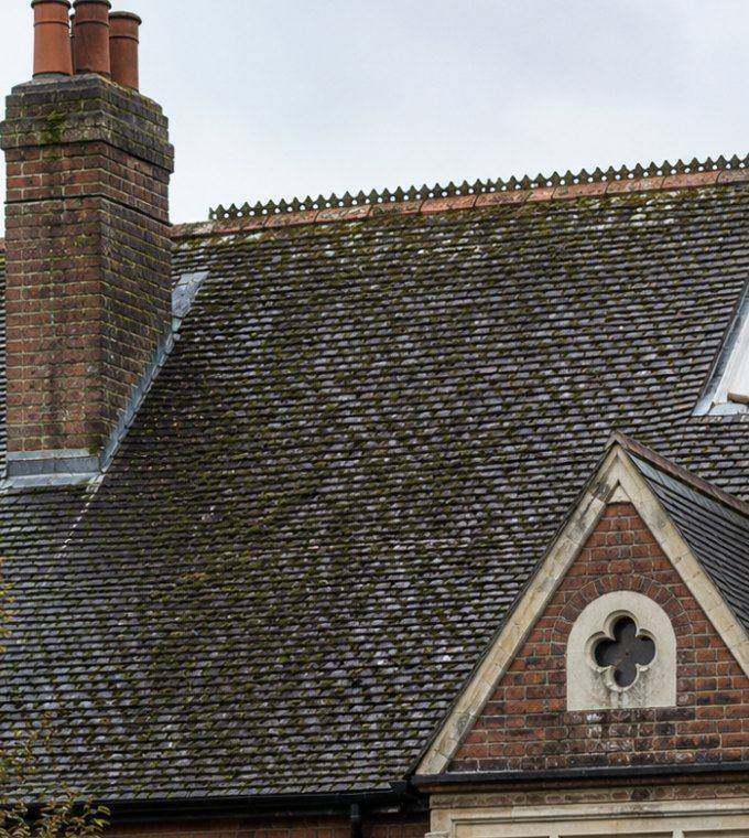Slate roof stained and dirty before cleaning